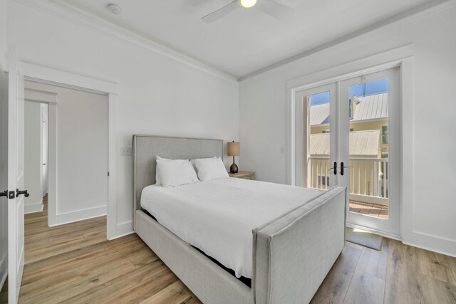 bedroom featuring ornamental molding, access to exterior, ceiling fan, french doors, and light hardwood / wood-style floors