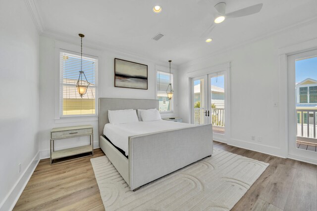 bedroom with french doors, light hardwood / wood-style floors, crown molding, access to exterior, and ceiling fan