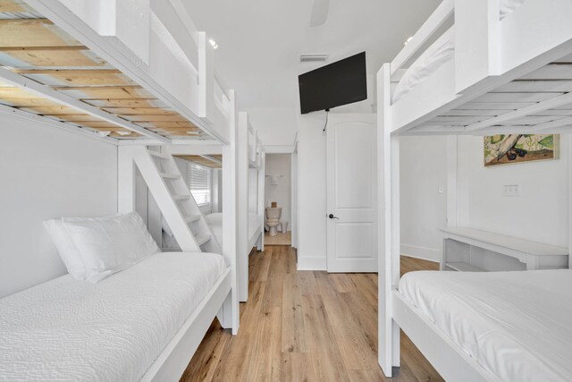 bedroom with light wood-type flooring