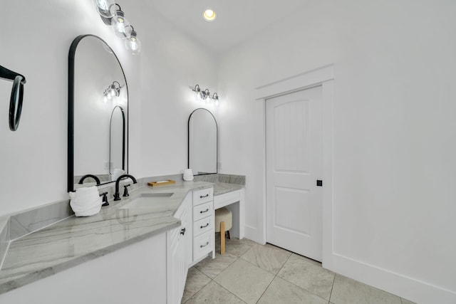 bathroom featuring vanity and tile patterned flooring