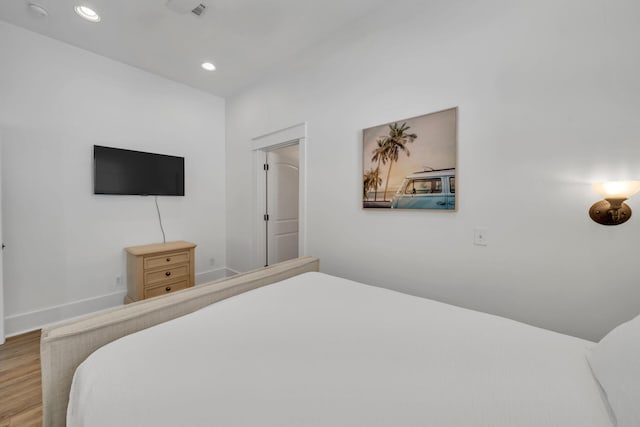 bedroom featuring hardwood / wood-style flooring