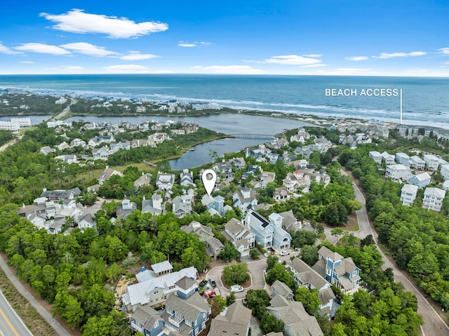 drone / aerial view with a view of the beach and a water view