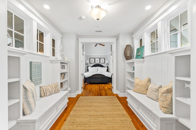 mudroom with light hardwood / wood-style flooring and ceiling fan