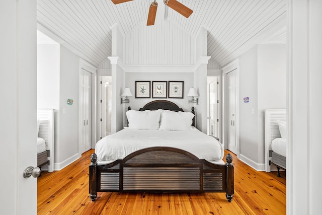 bedroom with ornamental molding, wood ceiling, light hardwood / wood-style flooring, and ceiling fan