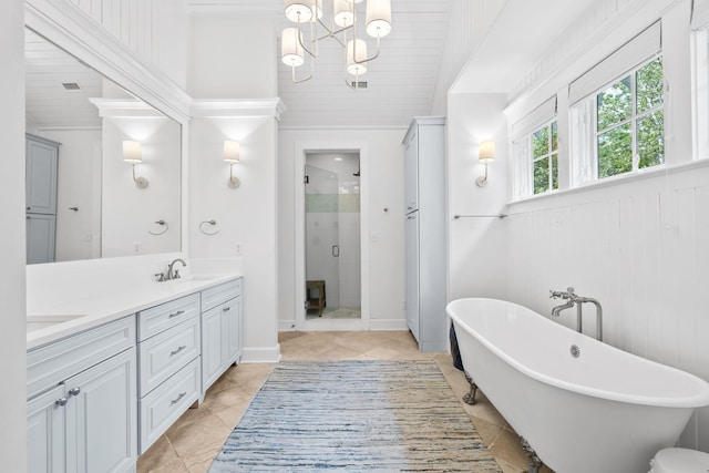 bathroom featuring lofted ceiling, independent shower and bath, tile patterned flooring, and vanity