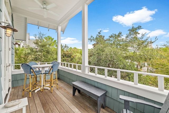 exterior space featuring ceiling fan