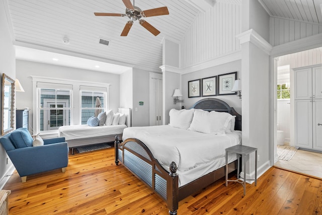 bedroom featuring wooden ceiling, high vaulted ceiling, wood-type flooring, and ceiling fan