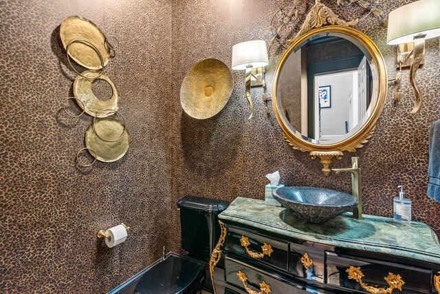 bathroom with vanity and toilet