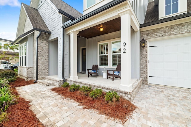 entrance to property featuring a garage