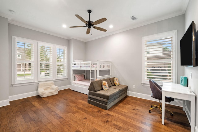 interior space featuring ceiling fan, hardwood / wood-style flooring, and crown molding