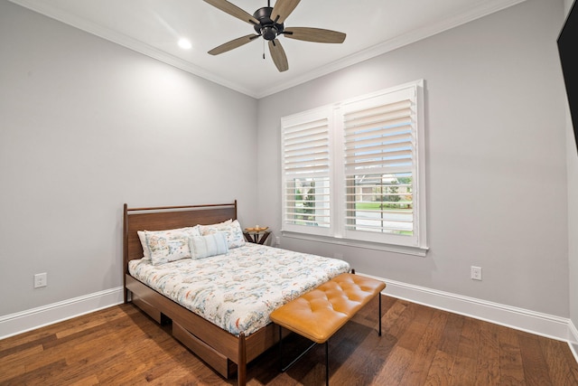 bedroom with ornamental molding, ceiling fan, and dark hardwood / wood-style flooring