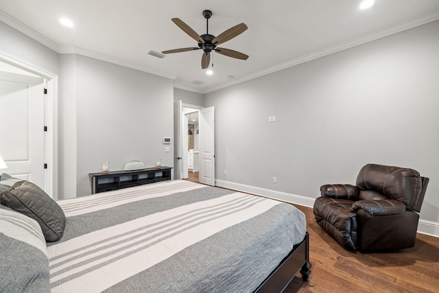 bedroom featuring crown molding, dark hardwood / wood-style floors, and ceiling fan