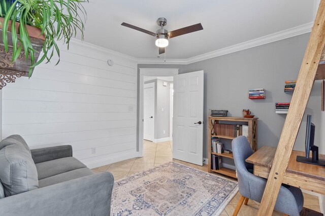 living room with ceiling fan, light tile patterned floors, and crown molding