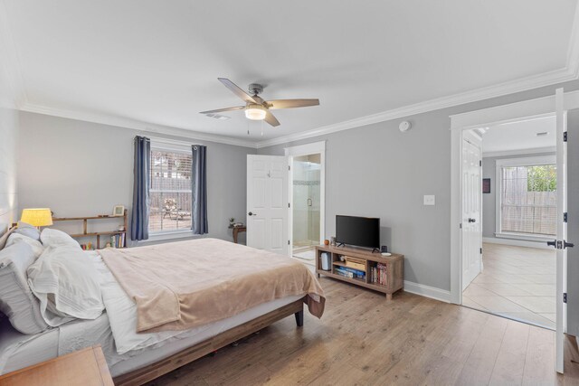 bedroom with light hardwood / wood-style flooring, ceiling fan, ornamental molding, and ensuite bathroom