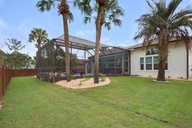 view of yard with a lanai