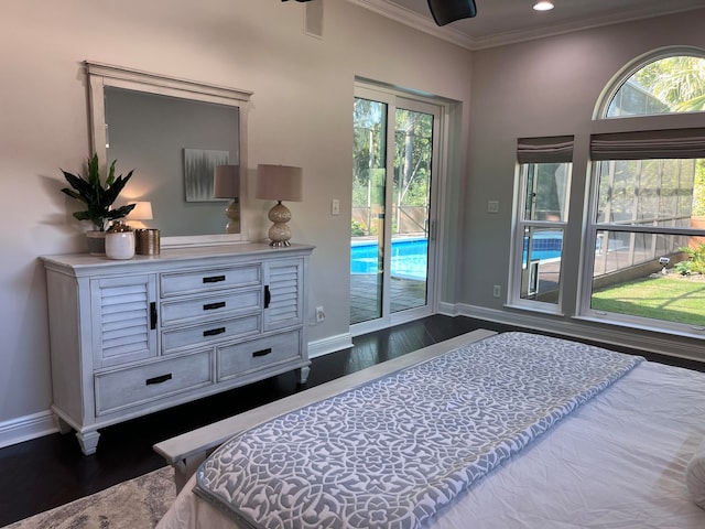 bedroom with access to outside, multiple windows, and dark hardwood / wood-style floors