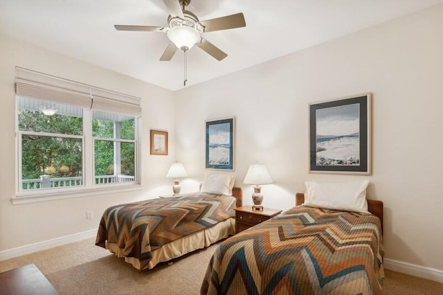 bedroom featuring ceiling fan and light colored carpet