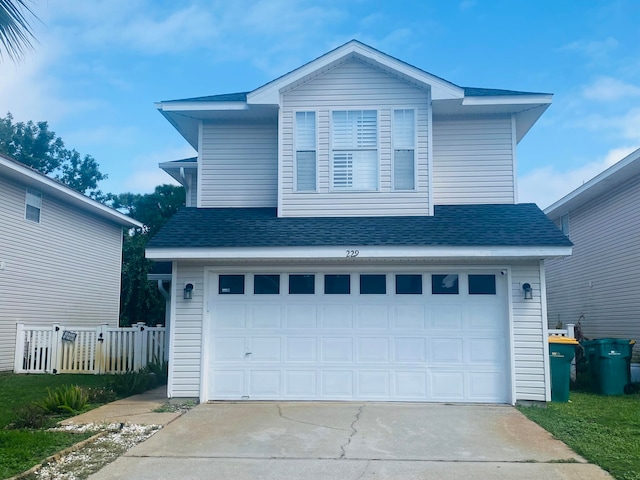 view of front property with a garage