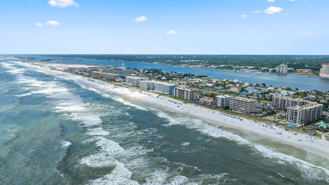 birds eye view of property featuring a view of the beach and a water view