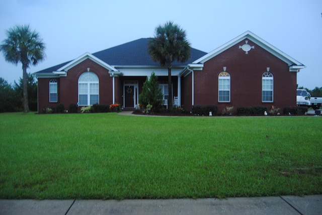139 Coastal Breeze Dr, Freeport, FL 32439 - ranch-style home with a front yard