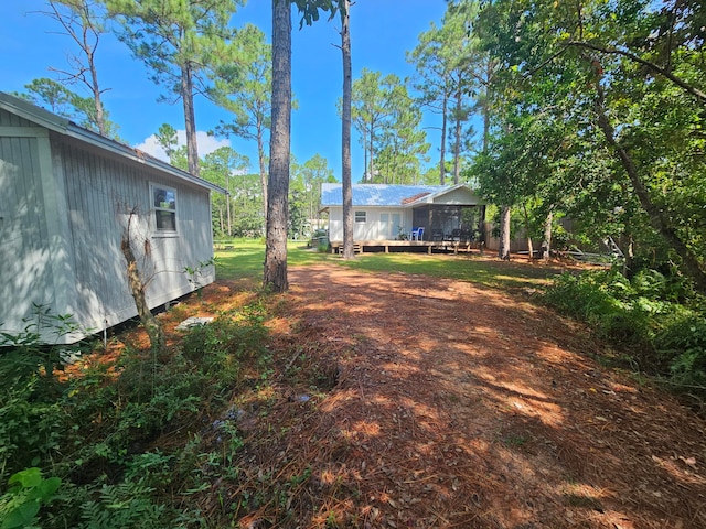 view of yard featuring a deck