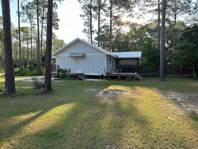 exterior space with a yard