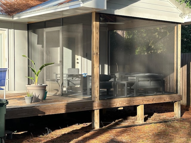 wooden terrace with a sunroom