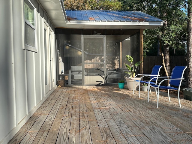 deck featuring a sunroom