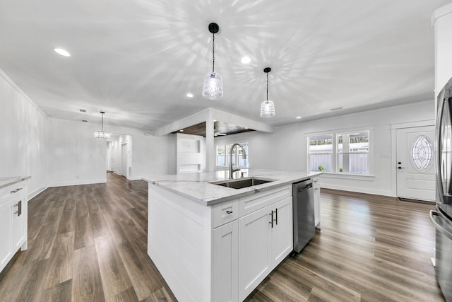 kitchen with sink, dishwasher, white cabinetry, light stone countertops, and decorative light fixtures