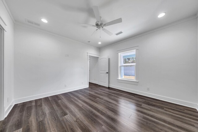 unfurnished bedroom with ceiling fan, ornamental molding, and dark hardwood / wood-style floors