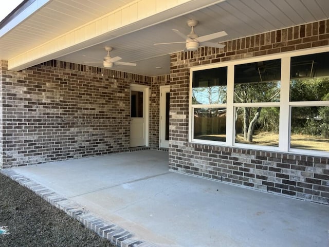 view of patio with ceiling fan