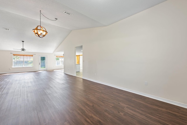 unfurnished living room featuring a textured ceiling, ceiling fan with notable chandelier, vaulted ceiling, and hardwood / wood-style flooring