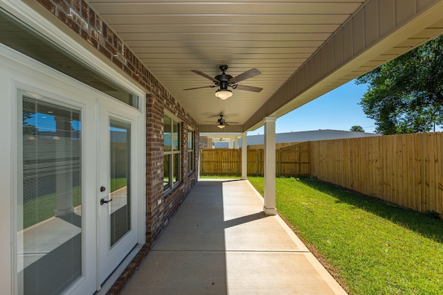 view of patio featuring ceiling fan