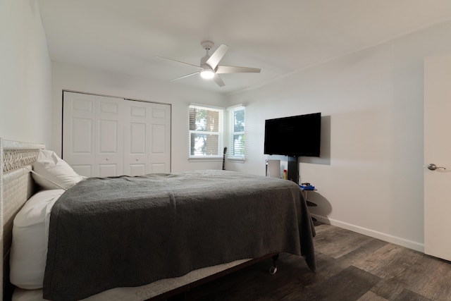 bedroom with a closet, ceiling fan, and dark wood-type flooring