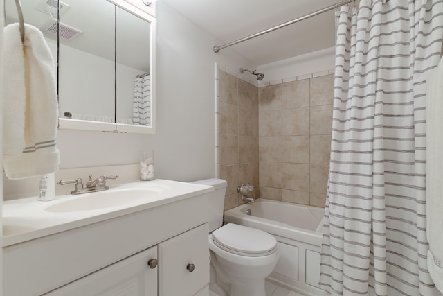 full bathroom featuring vanity, tile patterned floors, toilet, and shower / tub combo with curtain