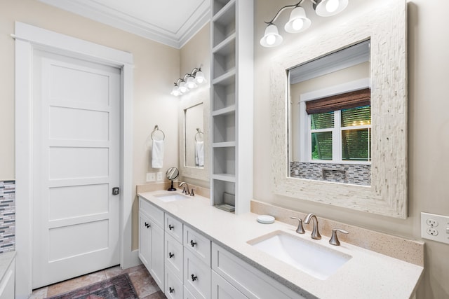 bathroom featuring ornamental molding and vanity