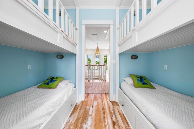 bedroom with light wood-type flooring