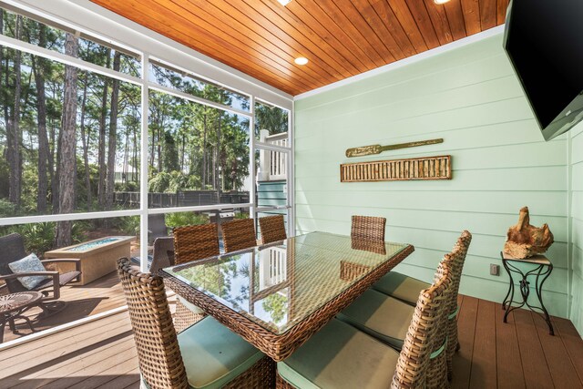 sunroom / solarium with wooden ceiling