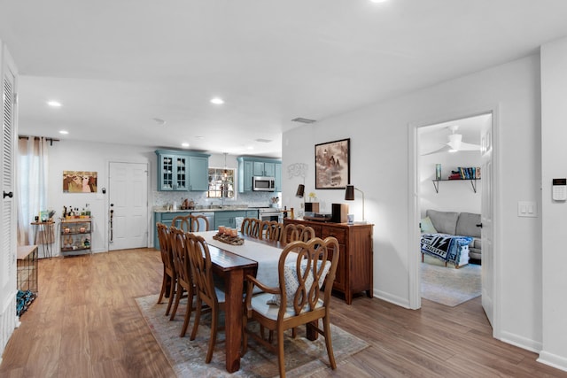 dining area with light wood-type flooring