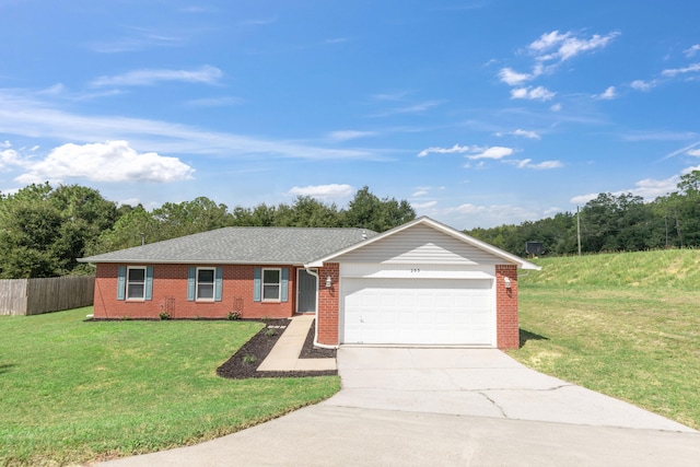 ranch-style house featuring a garage and a front lawn