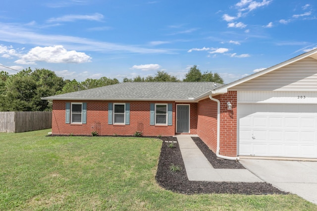 single story home featuring a front lawn and a garage