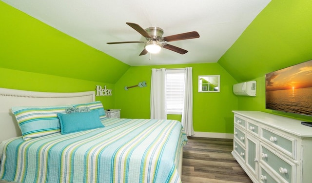 bedroom with a wall mounted AC, dark wood-type flooring, lofted ceiling, and ceiling fan