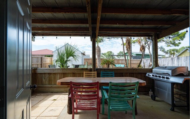 view of patio with a grill