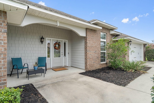 property entrance with a garage