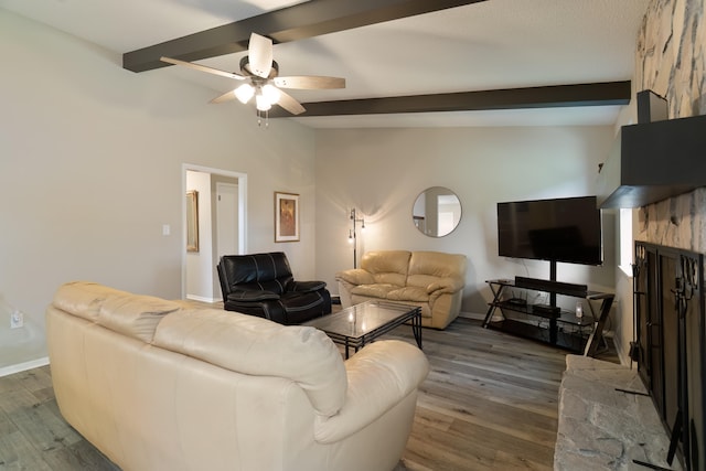 living room featuring beamed ceiling, dark hardwood / wood-style floors, ceiling fan, and high vaulted ceiling