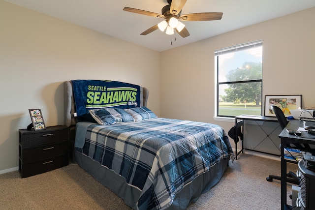 carpeted bedroom with ceiling fan