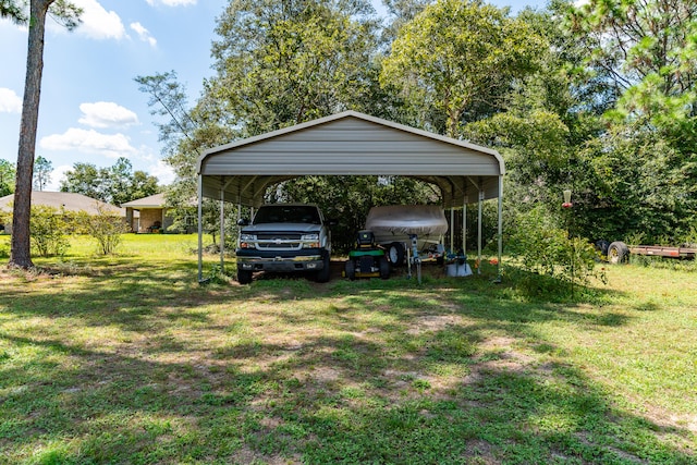 view of car parking with a yard and a carport