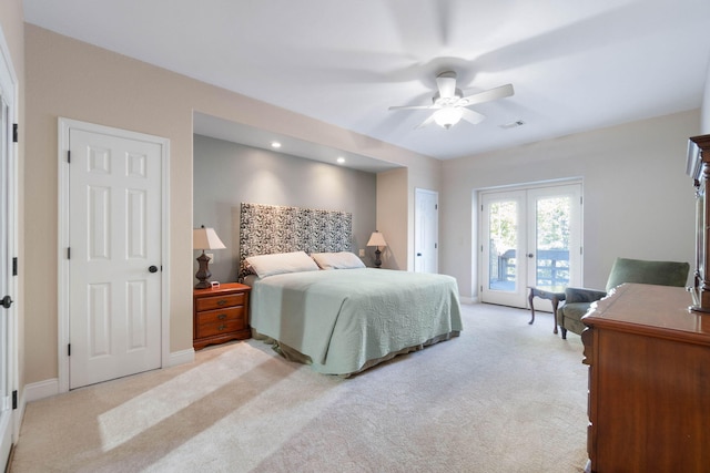 carpeted bedroom featuring access to outside, ceiling fan, and french doors