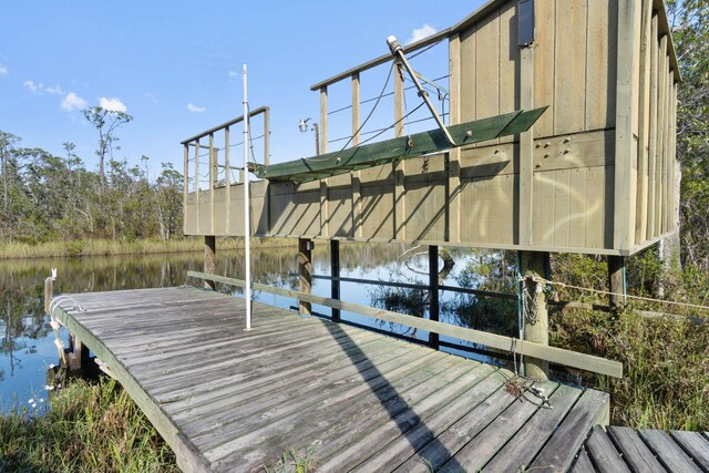 view of dock featuring a water view