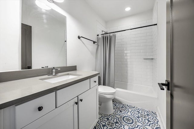 full bathroom featuring vanity, toilet, tile patterned flooring, and shower / bathtub combination with curtain